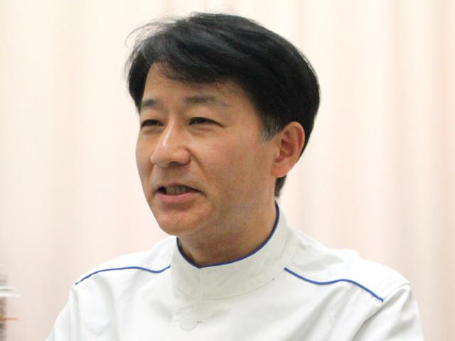 岡田 吉弘 院長